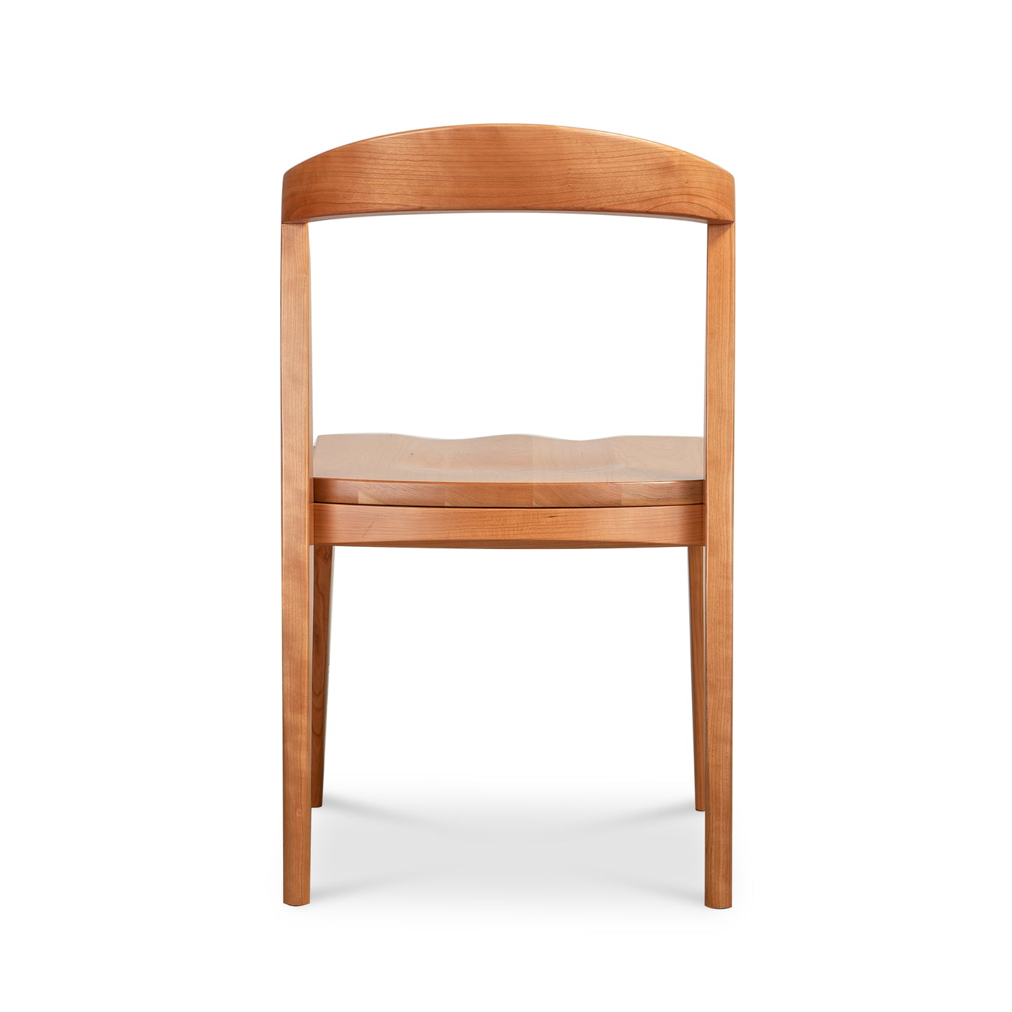 Montgomery Chair by Vermont Woods Studios, American made with a wood seat, curved backrest, and four straight legs, displayed from the rear view.