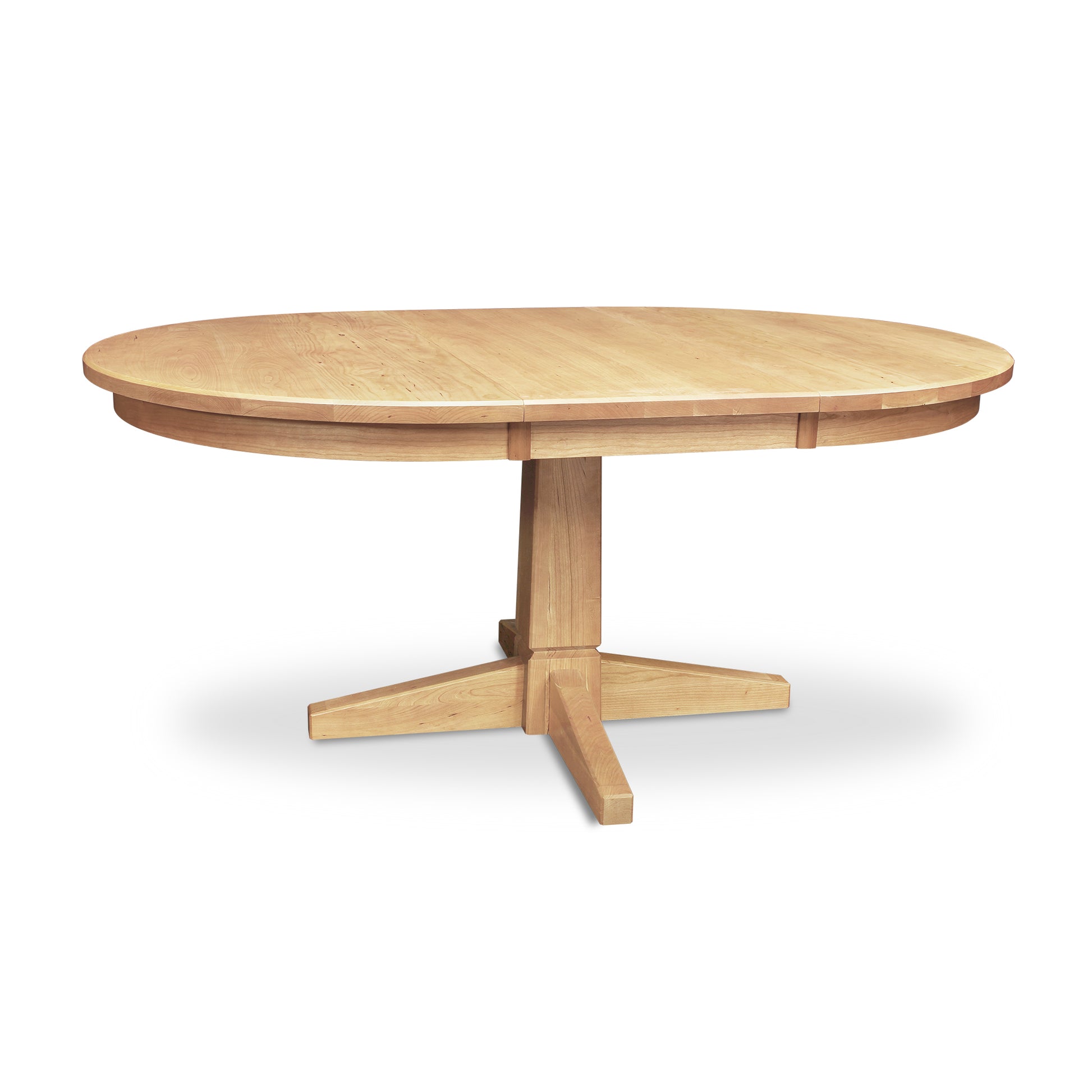 An eco-friendly Natural Vermont Single Pedestal Round Extension Table with a natural wood pedestal base by Lyndon Furniture.