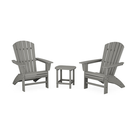 Two gray POLYWOOD Nautical 3-Piece Curveback Adirondack Sets facing each other, with a small matching side table between them, all positioned on a white background.