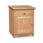 A Lyndon Furniture New England Shaker 1-Drawer Nightstand with Door and Arched Base made of hardwood with a single drawer and a base style design.