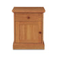 A small Lyndon Furniture New England Shaker 1-Drawer Nightstand with Door made of cherry hardwood, placed on a white background.