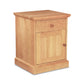 A small hardwood Lyndon Furniture New England Shaker 1-Drawer Nightstand with Door, crafted in cherry wood.