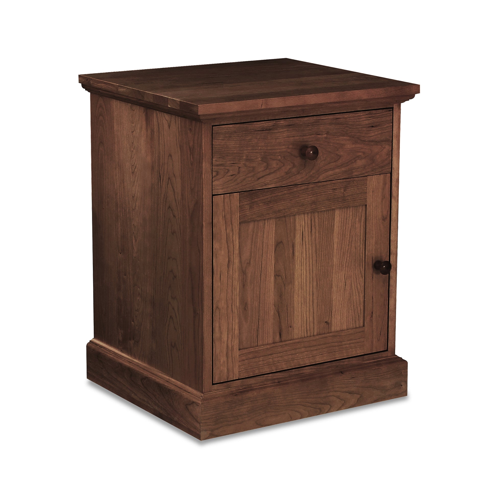 New England Shaker 1-Drawer Nightstand by Lyndon Furniture with a single door, minimalist handles, and medium brown wood grain finish.