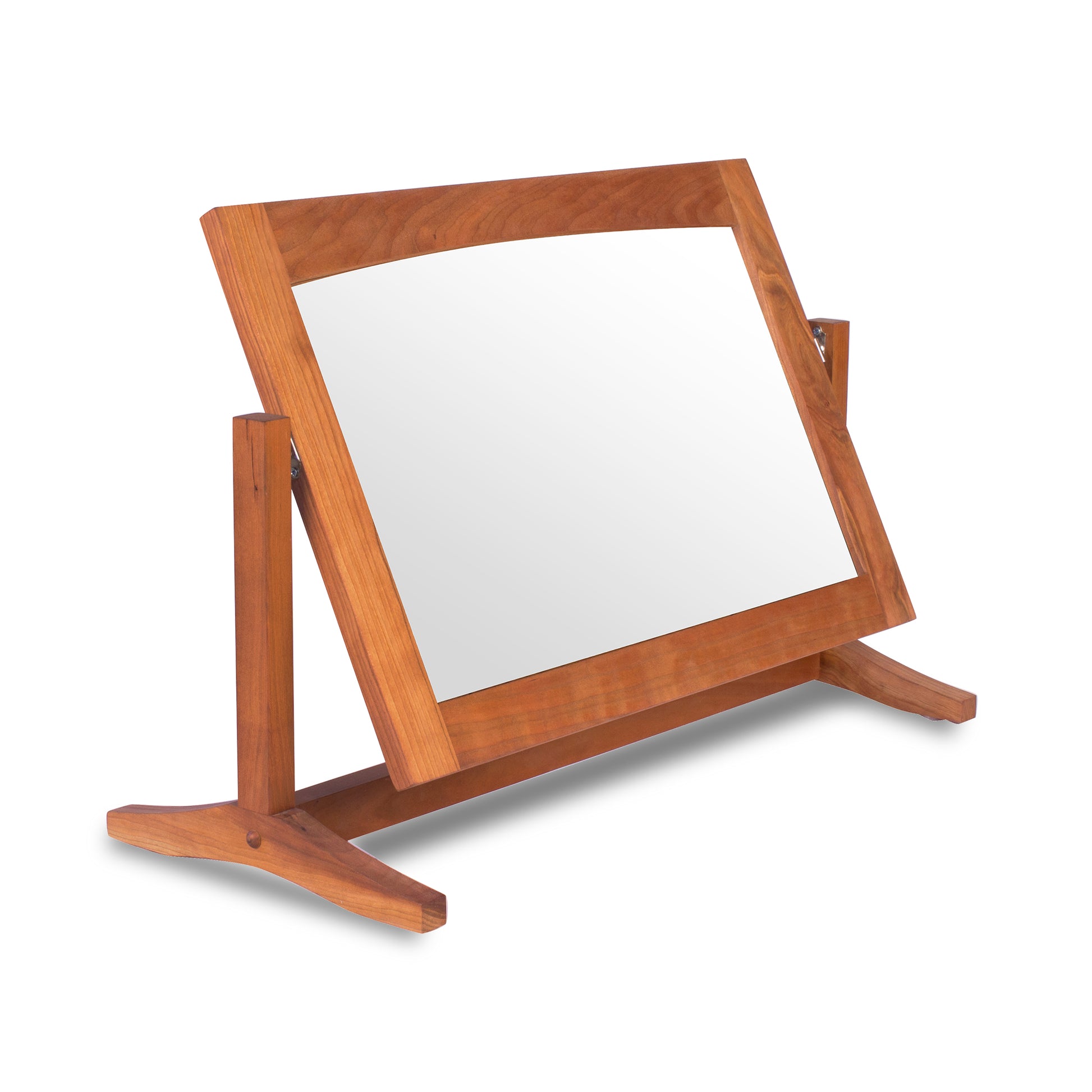 An adjustable wooden stand with a handcrafted New England Shaker Adjustable Dresser Mirror, sustainably harvested from Vermont's solid woods, by Lyndon Furniture.