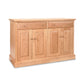 A New England Shaker Buffet from Lyndon Furniture, with two doors and two drawers, perfect for dining room storage.