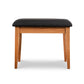 Lyndon Furniture New England Shaker Dressing Stool with black cushioned seat and four sturdy wooden legs.