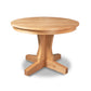 New Traditions Round Pedestal Extension Table in Oak by Lyndon Furniture – handcrafted solid wood with a central pedestal base, traditional American Mission style.