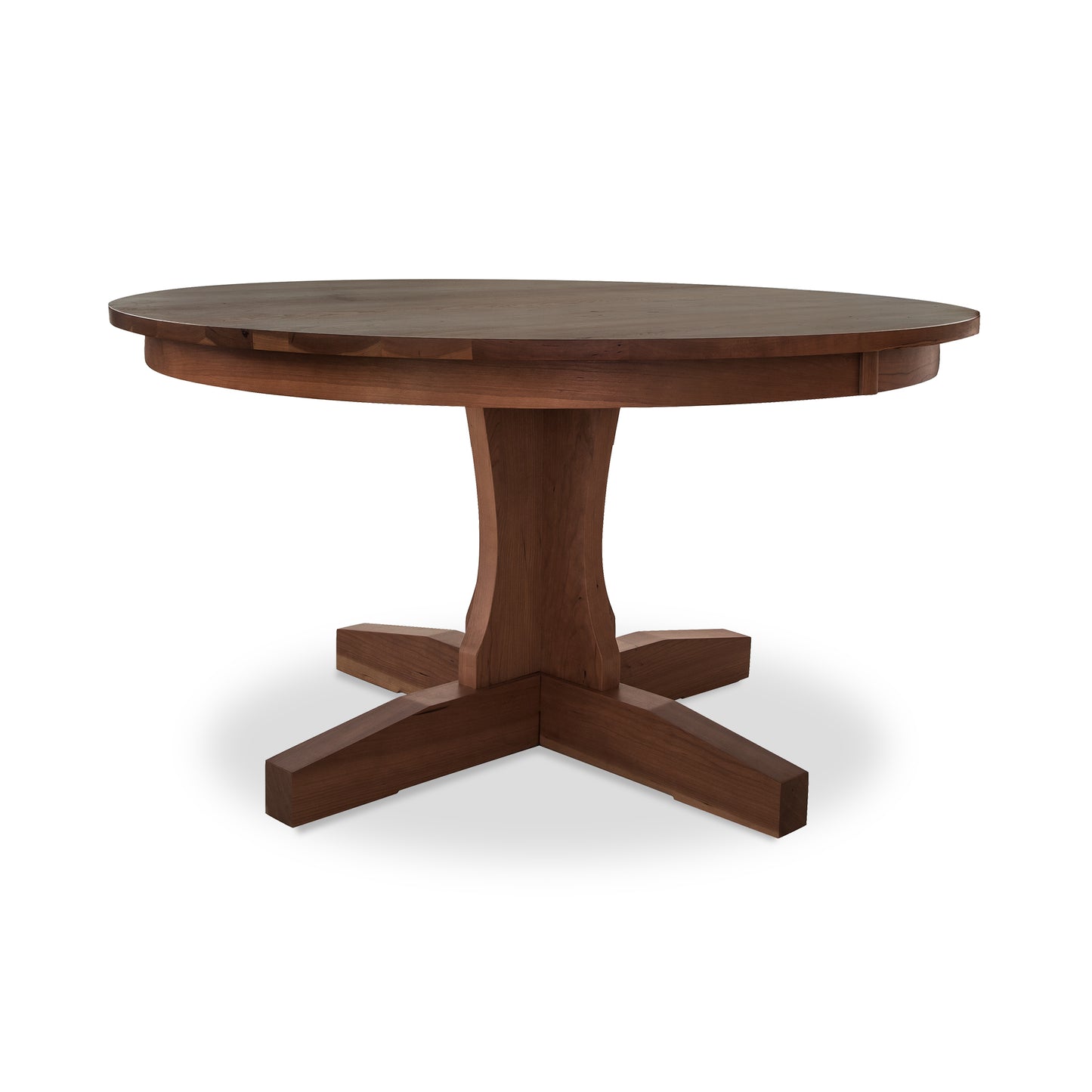 A New Traditions Round Pedestal Table by Lyndon Furniture, with four legs and a natural finish on a white background.