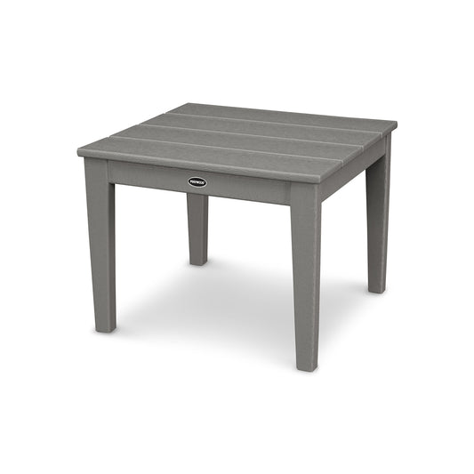 A gray, rectangular, POLYWOOD Newport 22" End Table with a slatted top and a small round logo on one side, displayed against a plain white background.