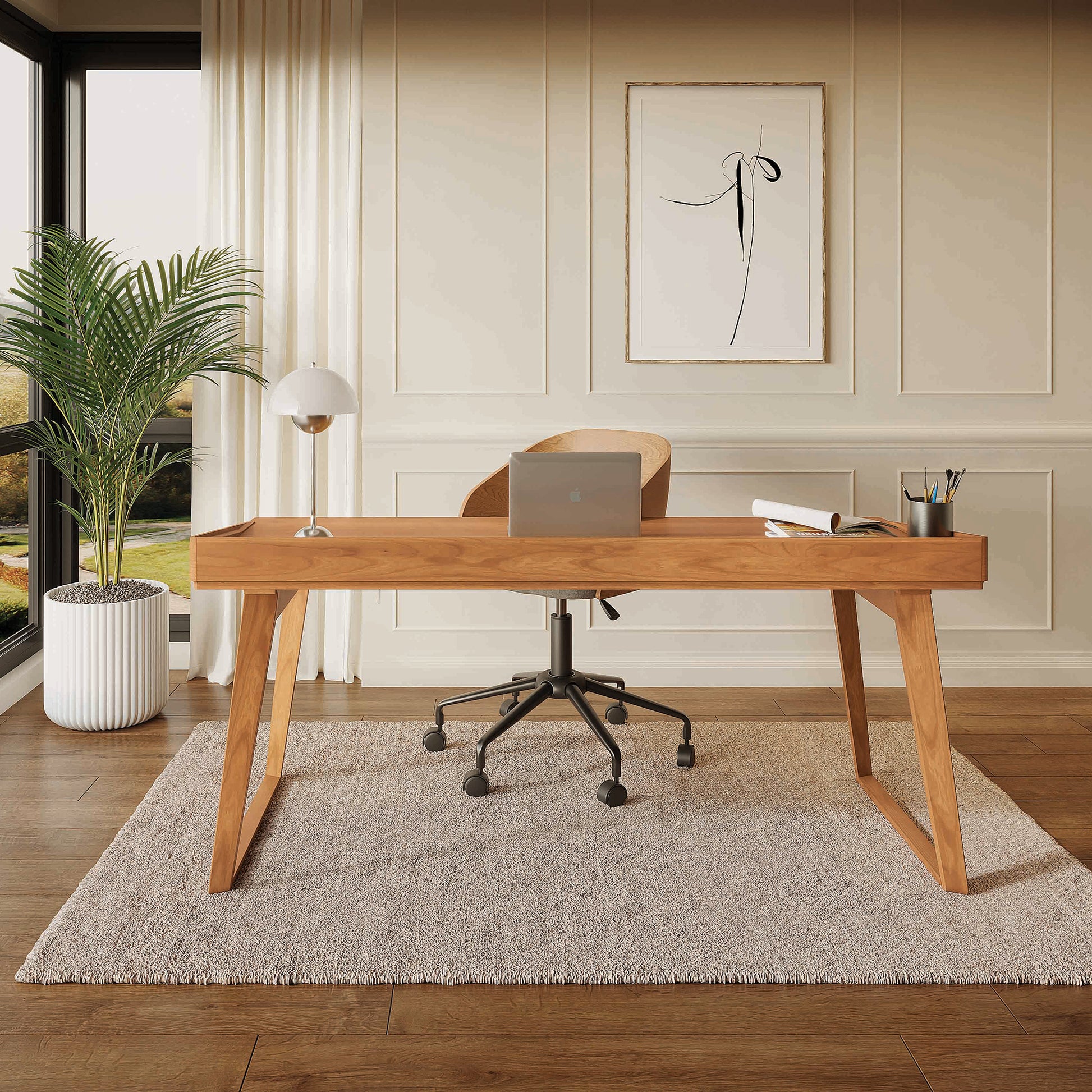 Copeland Furniture Odin Desk showcasing American-made craftsmanship, furnished with a laptop and lamp, perfect for a modern home office.