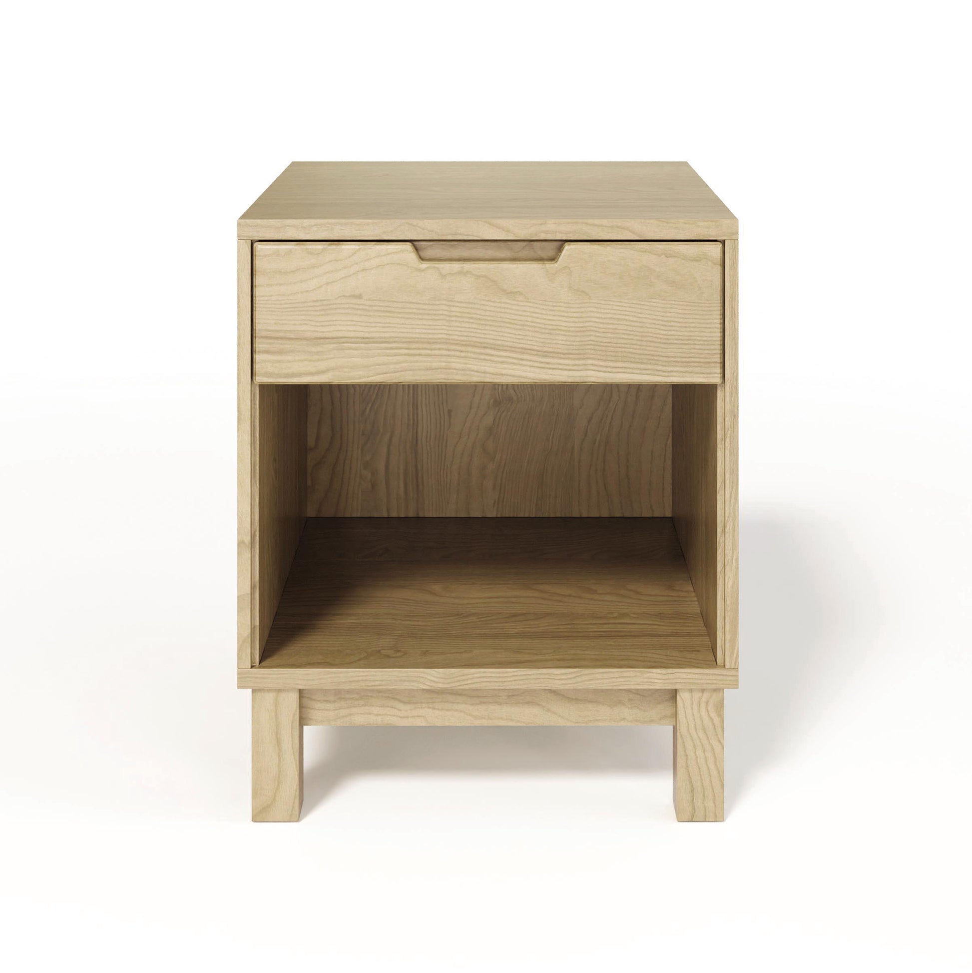 The Oslo 1-Drawer Enclosed Shelf Nightstand by Copeland Furniture is a small wooden nightstand with a drawer, featuring a sleek wood finish. It is crafted from solid oak hardwood, ensuring durability and longevity.