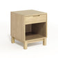 Solid oak Oslo Nightstand by Copeland Furniture featuring a drawer and enclosed shelf on four short legs.