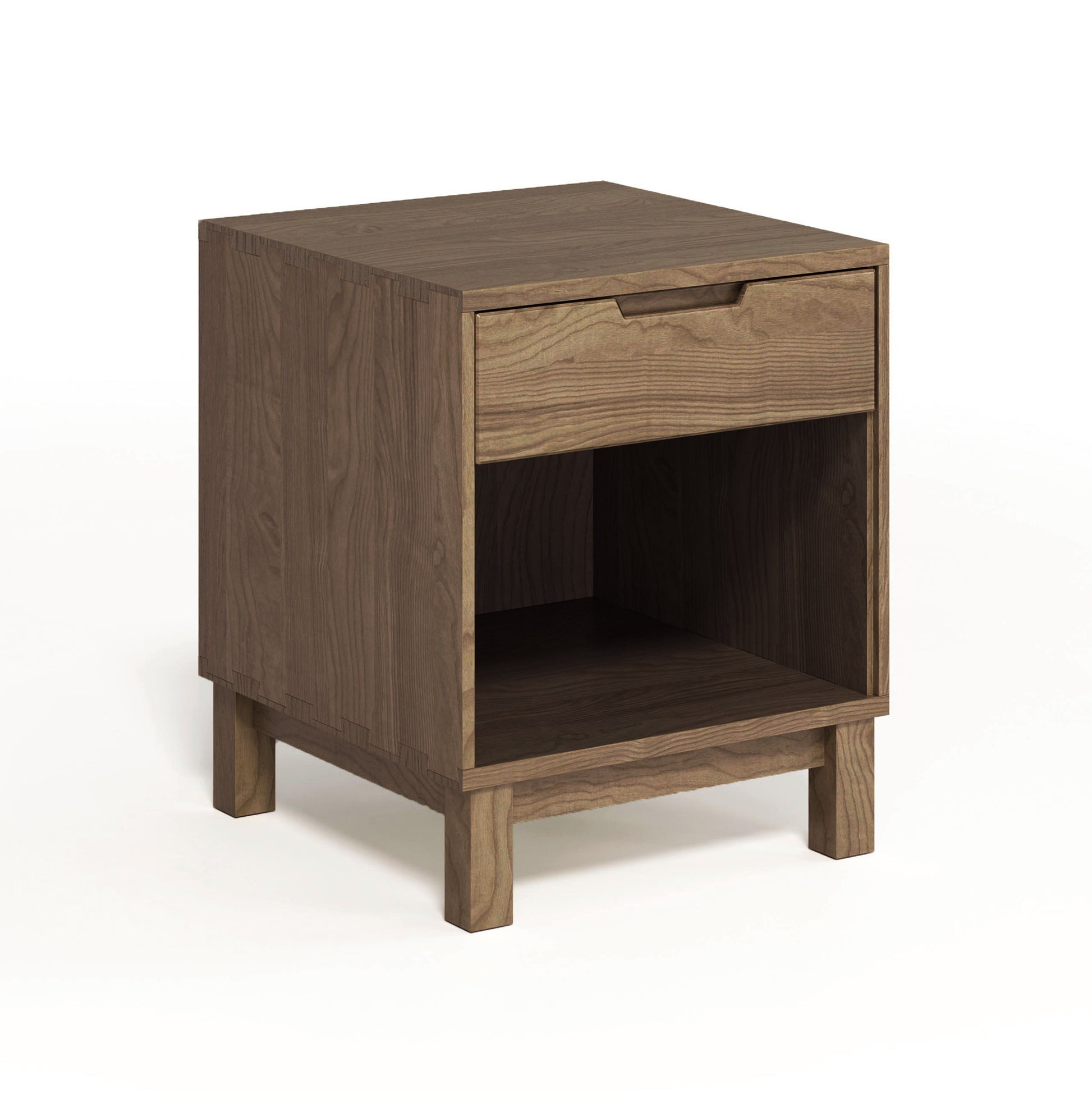 A small Oslo 1-Drawer Enclosed Shelf Nightstand from Copeland Furniture with a solid oak hardwood drawer on top and a wood finish.
