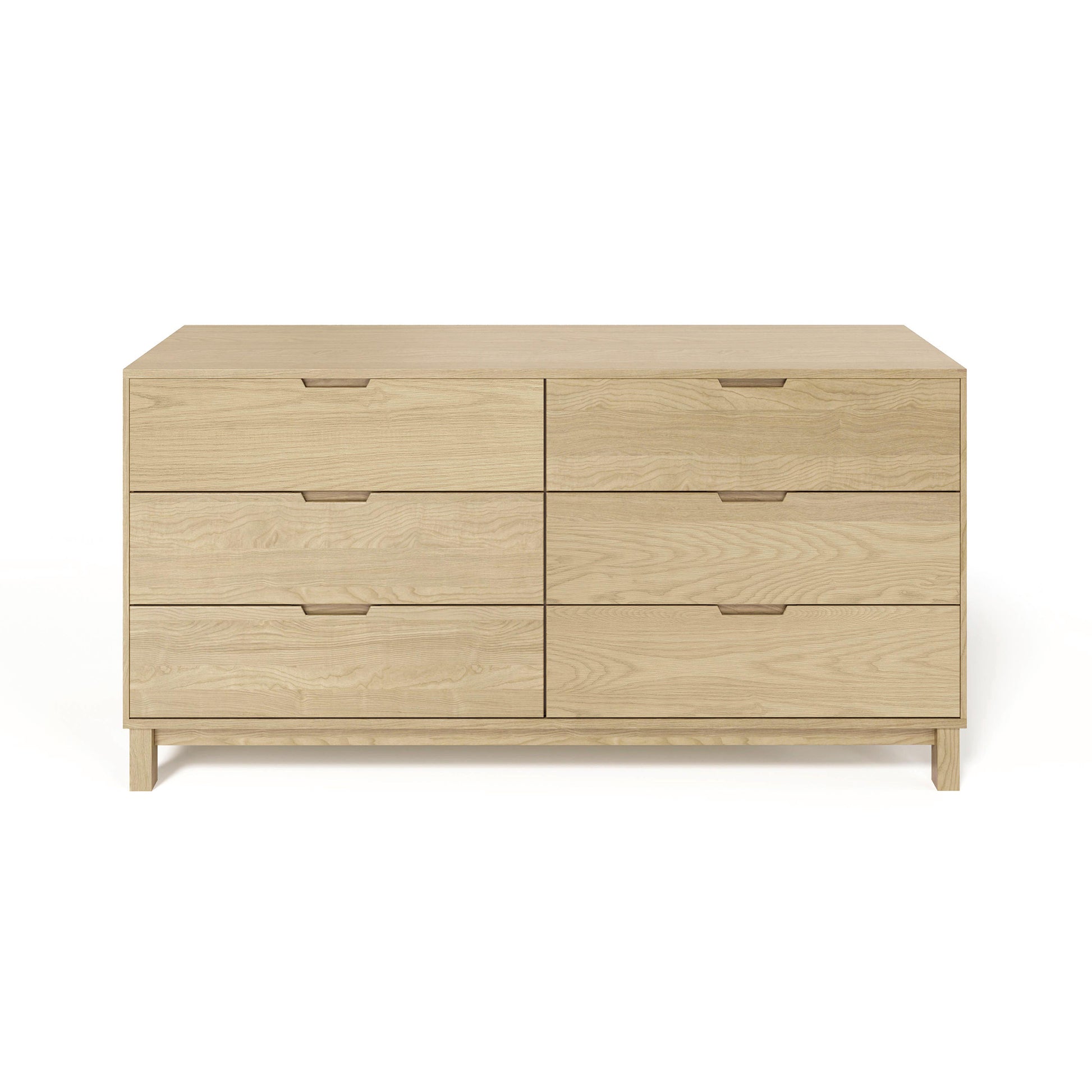 The Copeland Furniture Oslo 6-Drawer Dresser is a functional piece of bedroom storage. Made from solid natural oak hardwood, this wooden dresser features multiple drawers for ample organization. Set against a clean white design, it adds a sleek and modern touch to any bedroom.