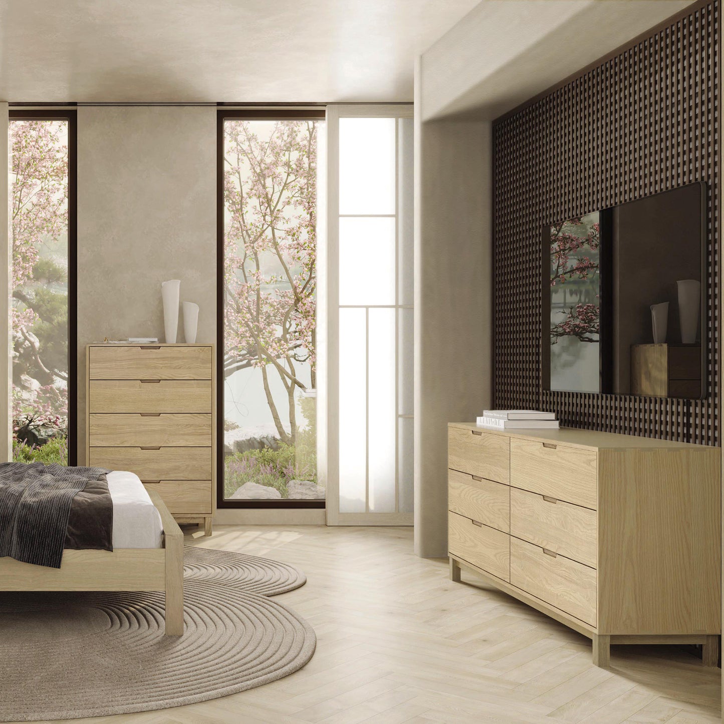 A modern bedroom with a solid oak hardwood Copeland Furniture Oslo 6-Drawer Dresser, large windows showing a blooming tree outside, and a circular rug on the floor.