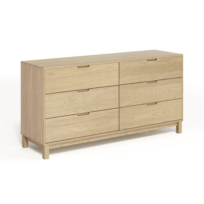 The Copeland Furniture Oslo 6-Drawer Dresser is a solid natural oak hardwood piece designed for bedroom storage.