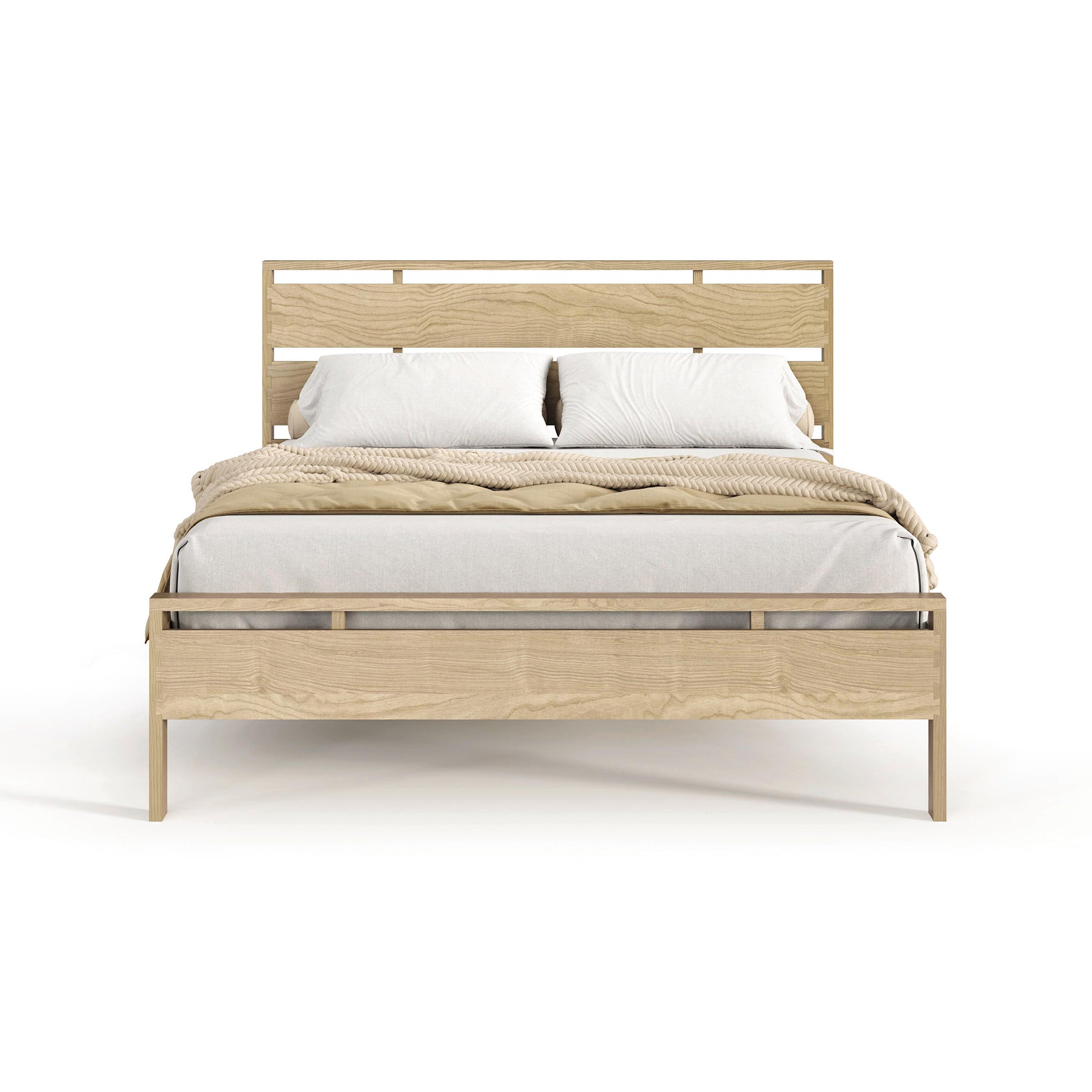 A modern solid oak hardwood bed frame with a headboard, from Copeland Furniture's Oslo Platform Bed collection, dressed with white and beige bedding, positioned against a white background.