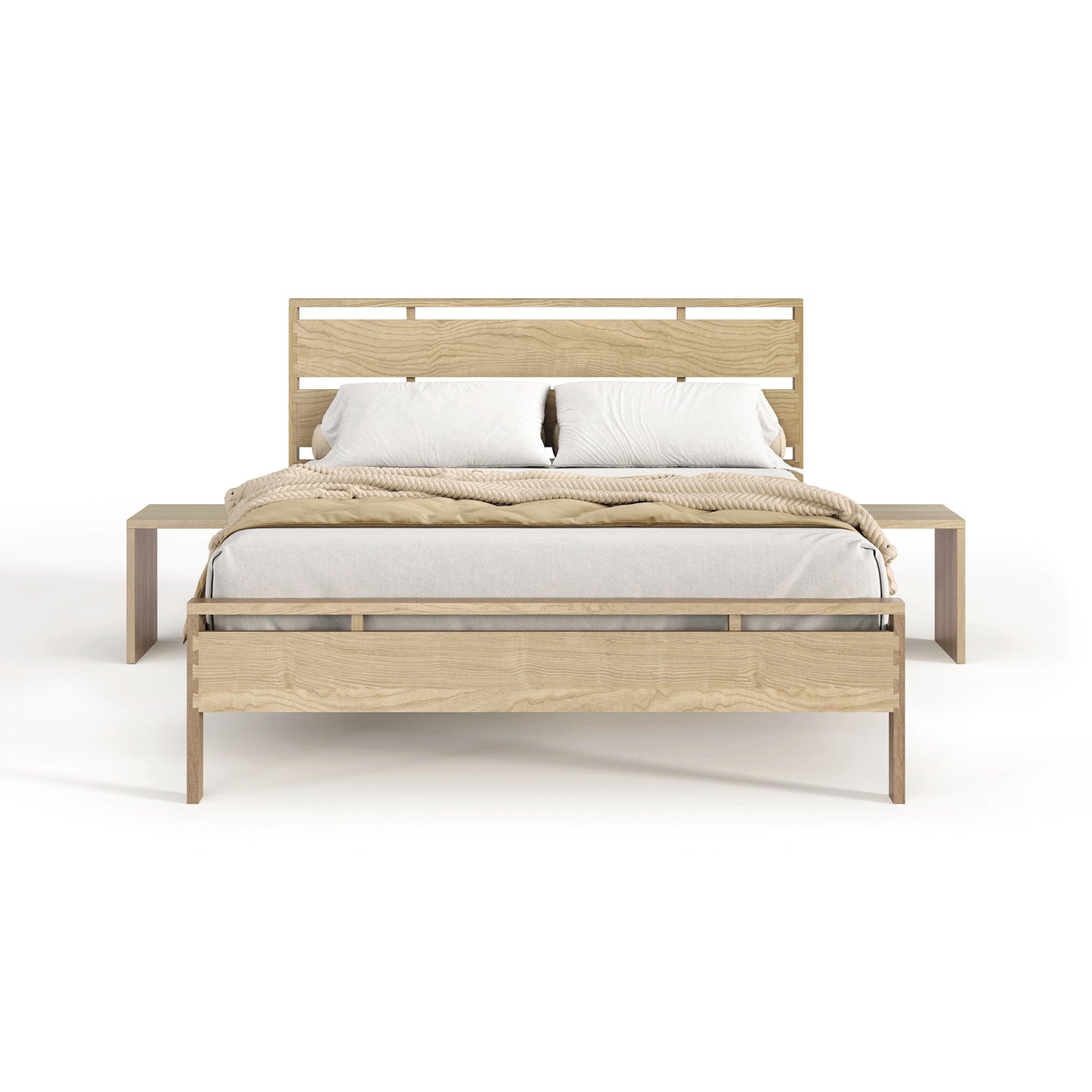A modern Oslo Platform Bed from Copeland Furniture, constructed of solid oak hardwood with a headboard, featuring white bedding and a beige blanket, set against a plain white background.