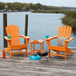 Two POLYWOOD Palm Coast Adirondack Chairs and a matching table showcased outdoors, highlighting the quality craftsmanship and design of the furniture.