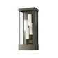 Hubbardton Forge Portico Large Outdoor Sconce with three frosted glass shades and a sleek metallic frame in Coastal Dark Smoke finish.