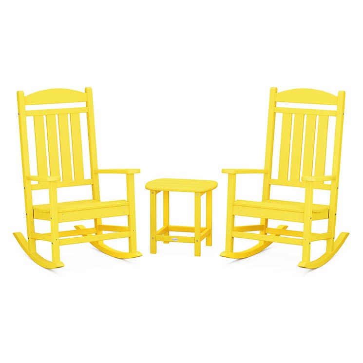 Two yellow rocking chairs and a table on a white background.