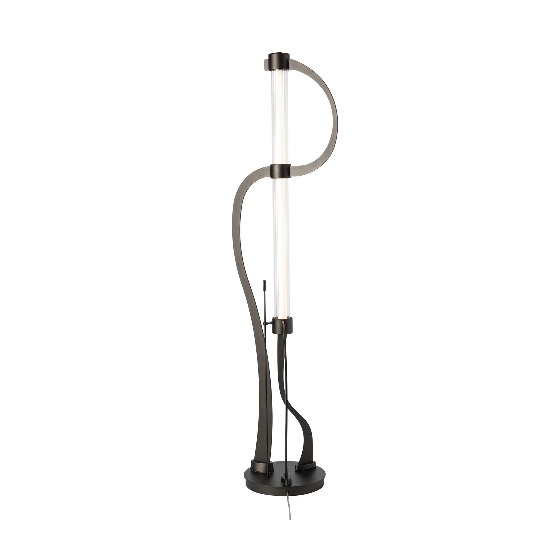 Pulse Floor Lamp by Hubbardton Forge featuring a stylish, twisting black metal frame of hand-forged steel, with a vertical light tube on a robust round base.