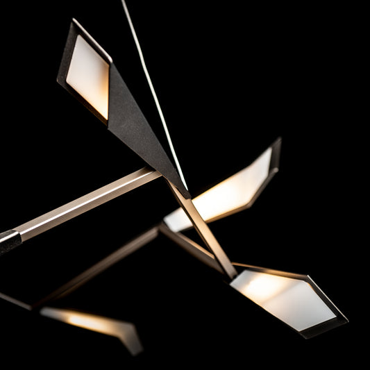 Quill Pendant by Hubbardton Forge with distinctive angled illuminated panels, showcasing its modern design and craftsmanship.