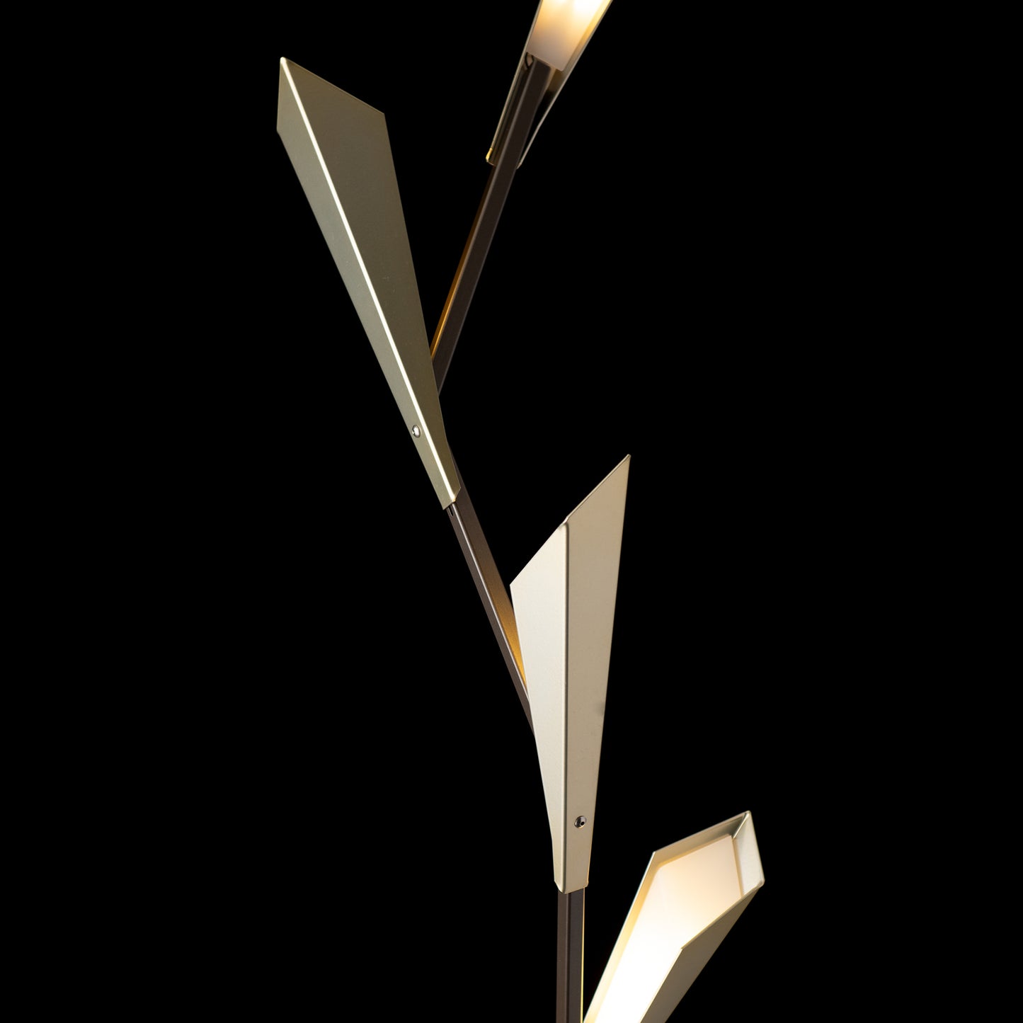 Quill Torchiere Floor Lamp by Hubbardton Forge with three distinctive angular metallic shades, showcasing elegant modern craftsmanship.