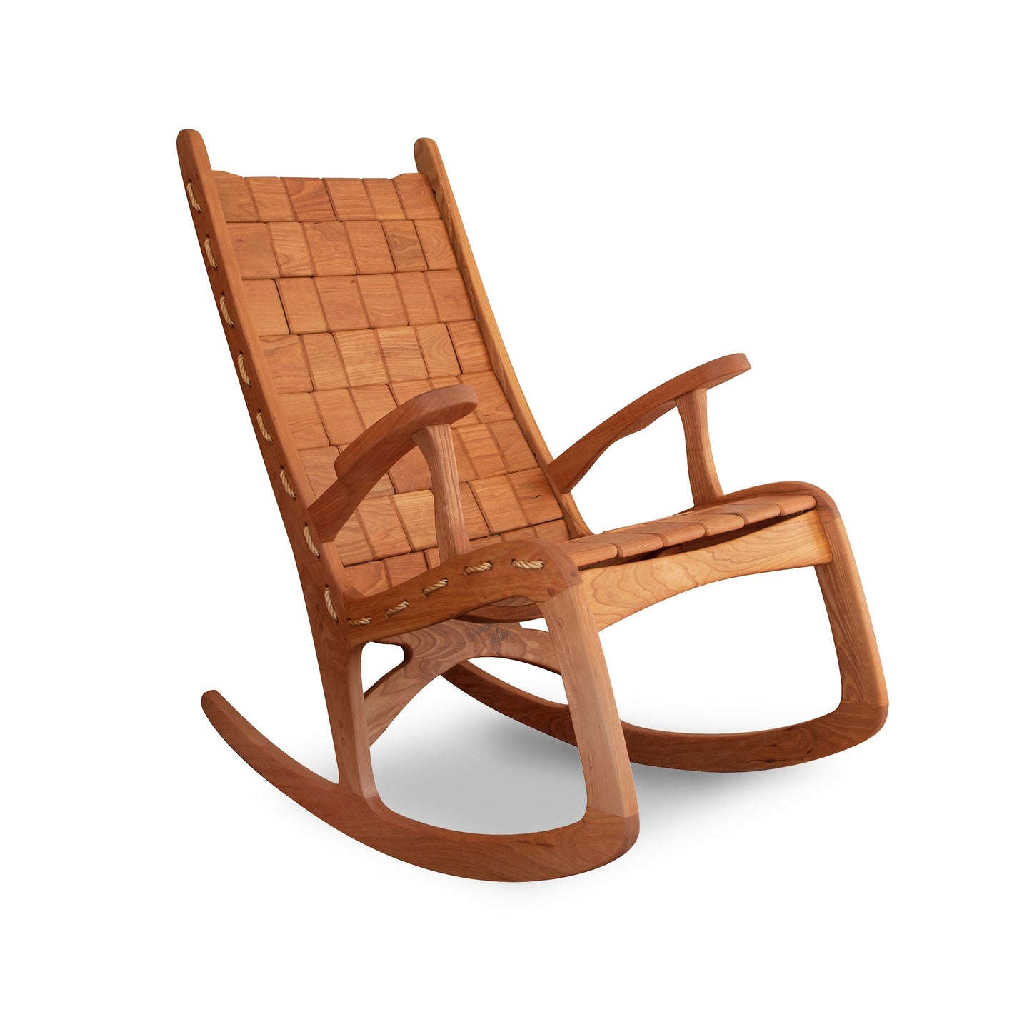 A wooden rocking chair on a white background.