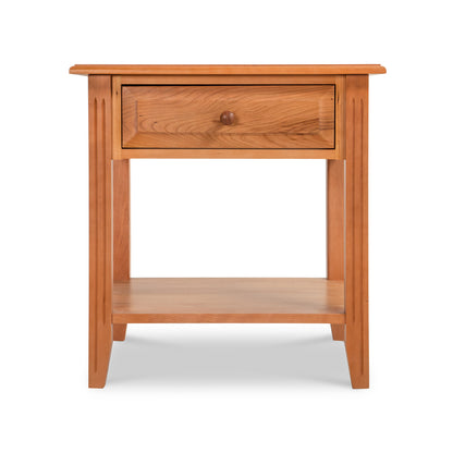 A Lyndon Furniture Renfrew Shaker 1-Drawer Open Shelf Nightstand, crafted from solid hardwoods with a drawer on top.