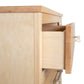 Rockingham 5-Drawer Chest by Vermont Woods Studios in close-up, featuring expert dovetail joints and sleek metal handles, showcasing quality craftsmanship.