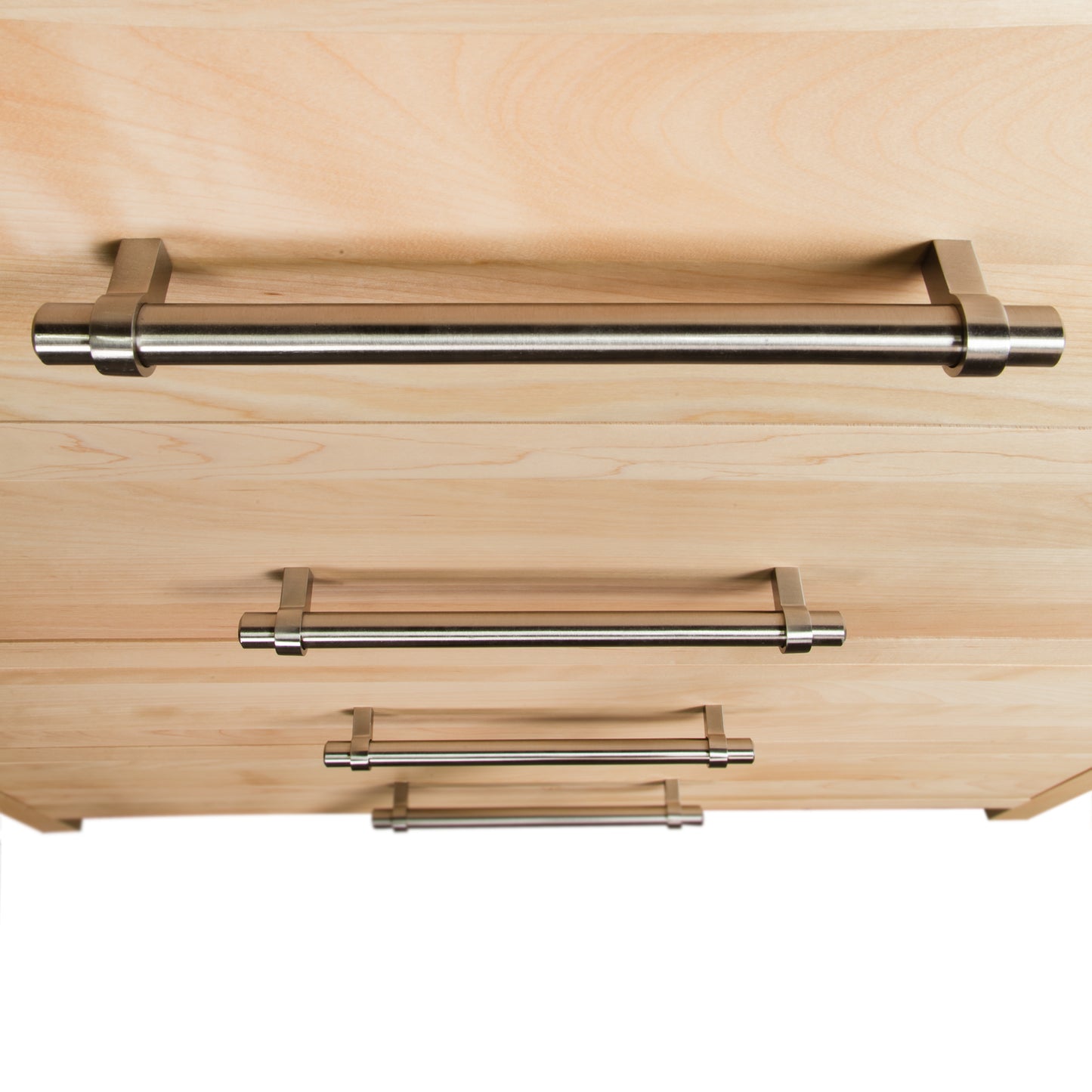 Detail view of stainless steel handles on the Rockingham 5-Drawer Chest by Vermont Woods Studios, showcasing American made wood craftsmanship.