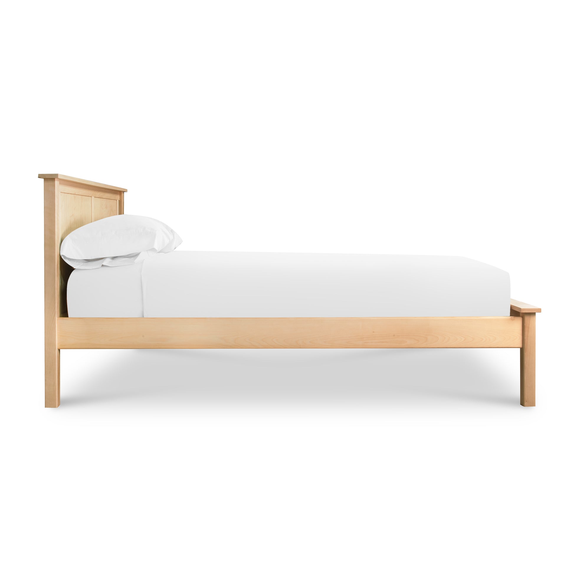 Rockingham Bed by Vermont Woods Studios with light wood frame and headboard, highlighting its handcrafted American-made quality.