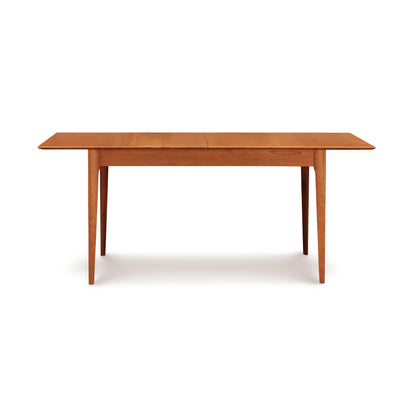 Copeland Furniture Sarah Shaker Tapered Leg Extension Table crafted from solid wood, showcasing its elegant design and fine craftsmanship.