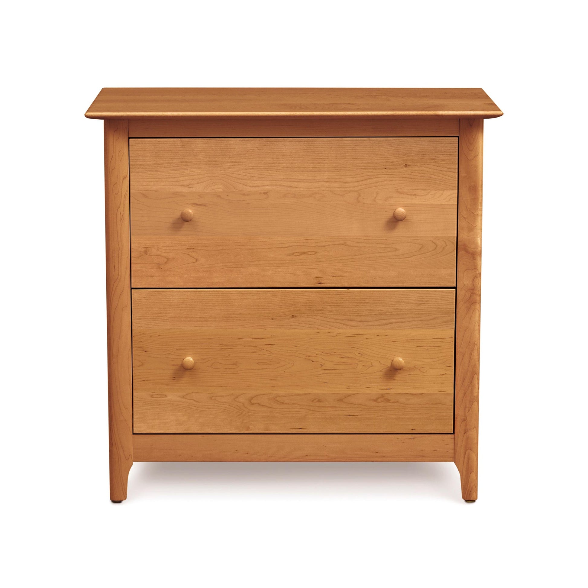A wooden chest of drawers with two drawers.
