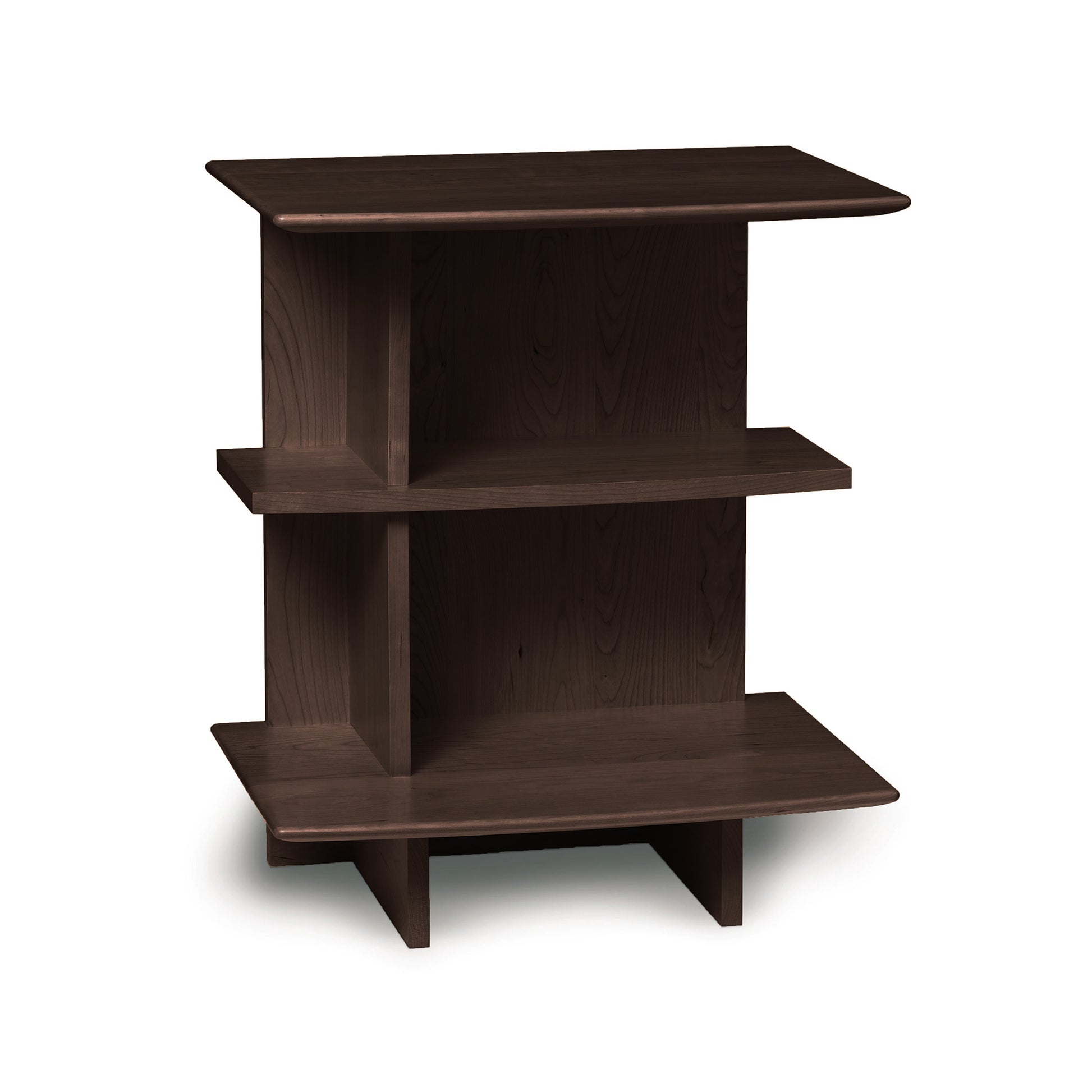 A dark brown Sarah Open Shelf Nightstand with two shelves, designed in Copeland Furniture's Sarah solid wood collection.