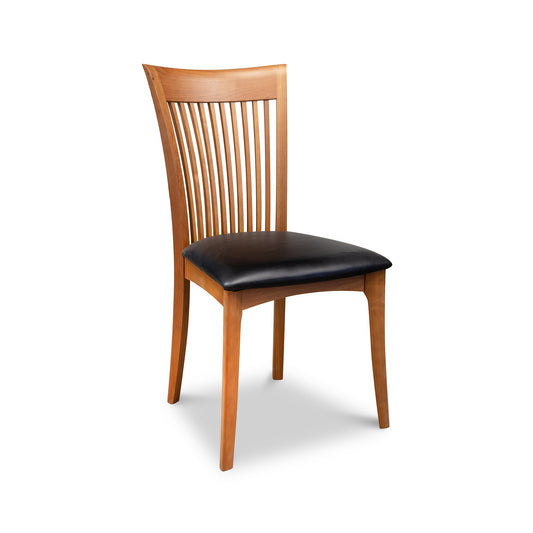 A wooden dining chair with black leather seat, perfect for those seeking the Copeland Furniture Sarah Shaker Side Chair with Leather Upholstery - Clearance.