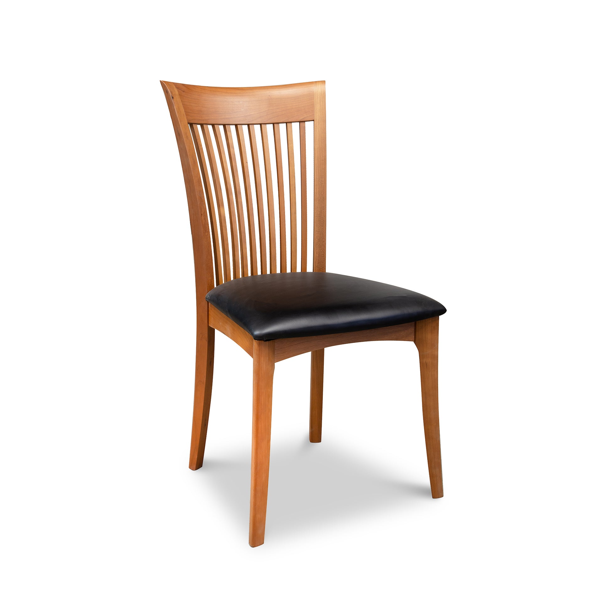 Copeland Furniture Sarah Shaker Chair featuring a slatted back and black cushioned seat, handcrafted in Vermont from solid American hardwood.