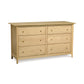 A luxurious Sarah 6-Drawer Dresser handcrafted in American Shaker design, featuring drawers on a pristine white background by Copeland Furniture.