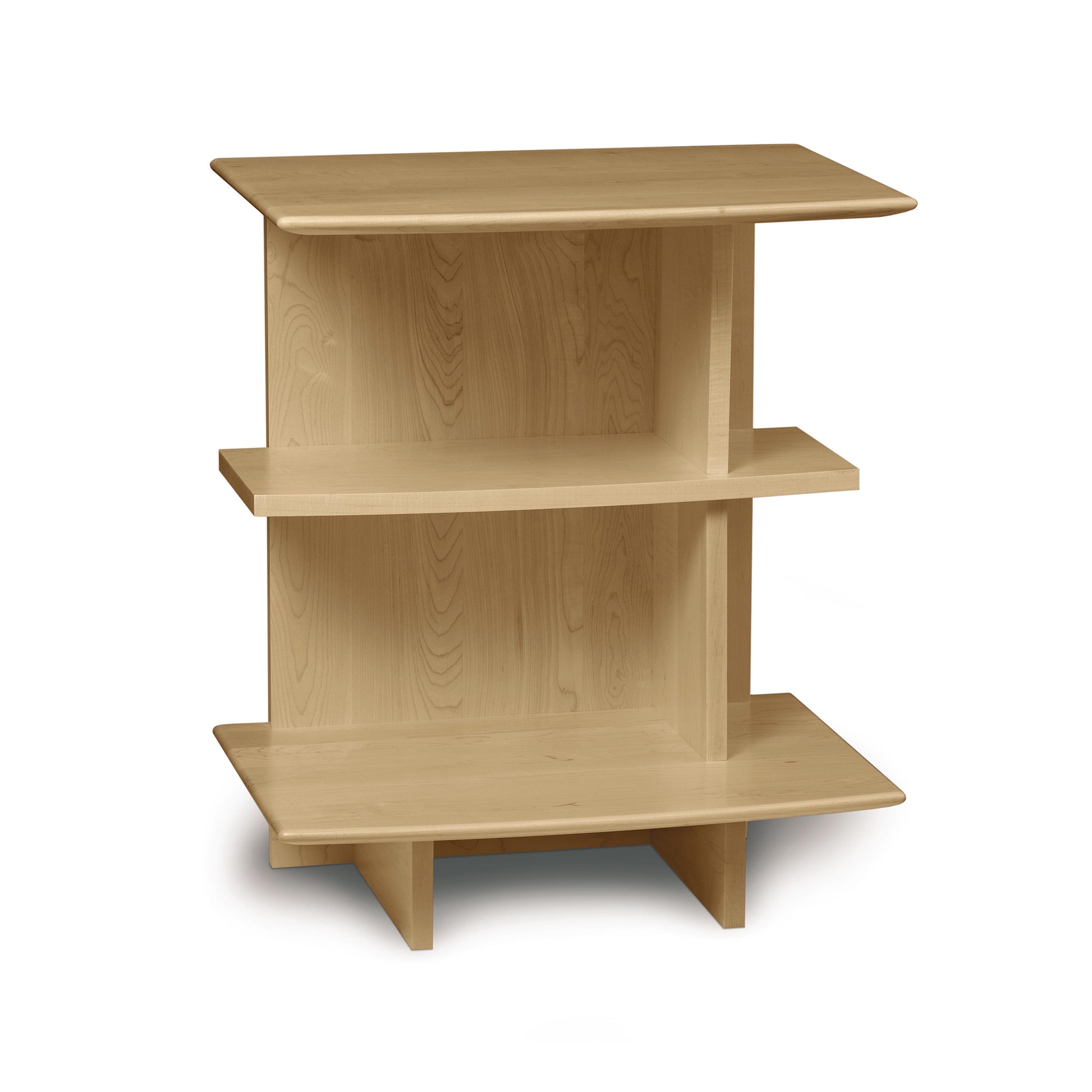 The Sarah Open Shelf Maple Nightstand - Right -Clearance from Copeland Furniture features a small wooden shelf perfect for under-bed storage. With its Copeland's solid wood craftsmanship, this shelf will add a touch of elegance to any room.