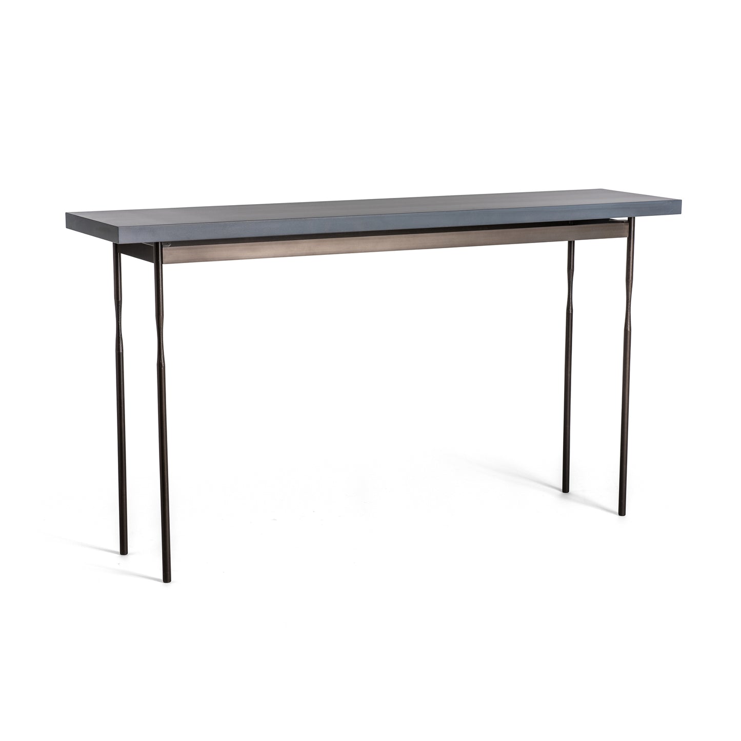 The Hubbardton Forge Senza Wood Top Console Table showcases a minimalist design with a sleek, rectangular dark grey tabletop and handcrafted steel legs, making its simple and modern aesthetic suitable for various interior spaces.