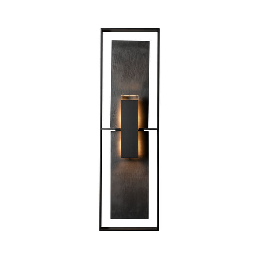 Hubbardton Forge Shadow Box Tall Slate Sconce with contemporary dark metal frame, highlighting the sconce’s modern design and craftsmanship.