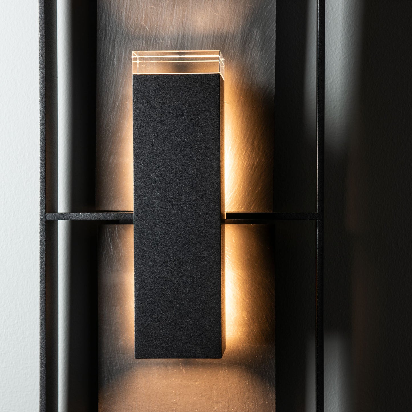 Hubbardton Forge Shadow Box Tall Slate Sconce with a modern, minimalist design and warm, dark-sky-friendly illumination.
