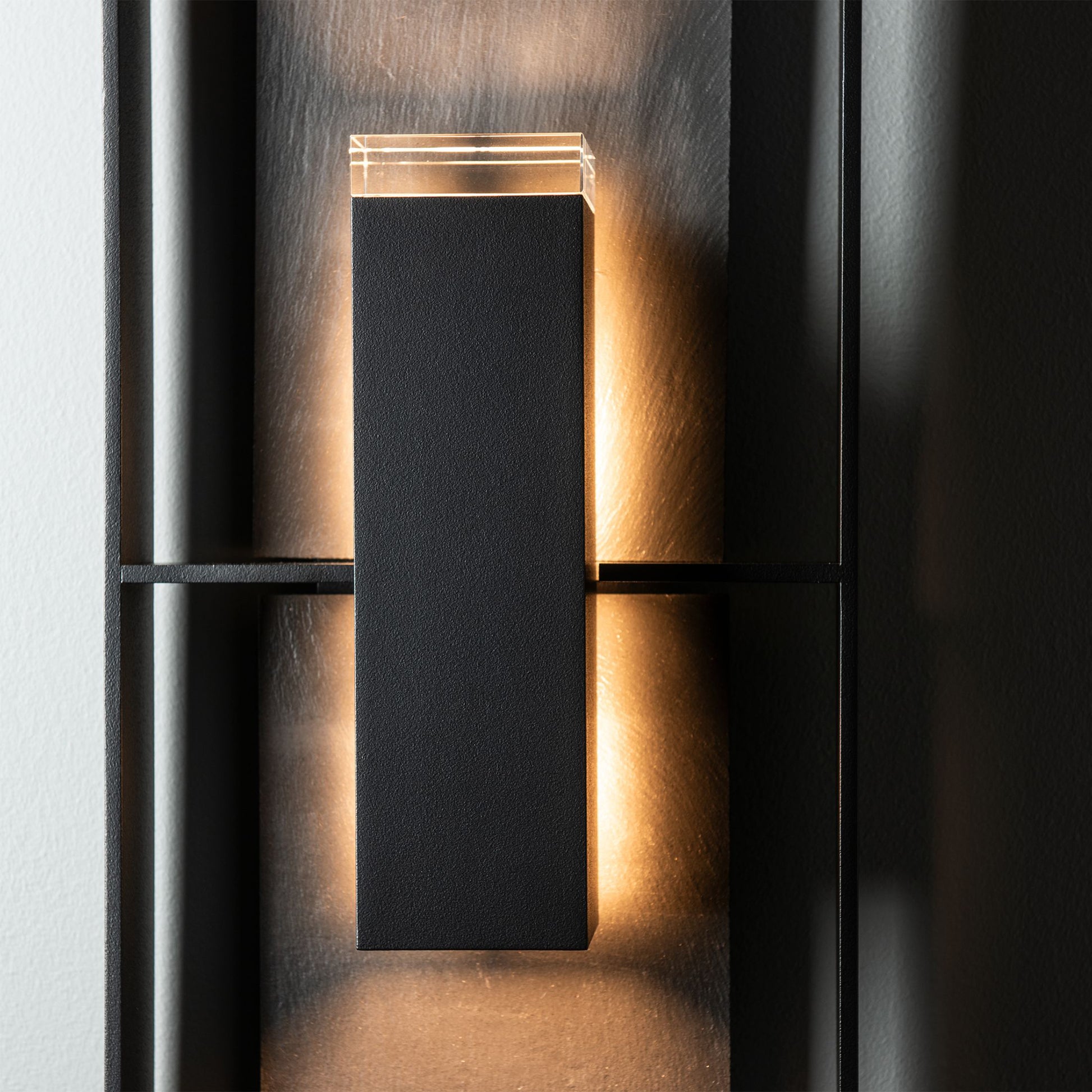 Hubbardton Forge Shadow Box Tall Slate Sconce with a modern, minimalist design and warm, dark-sky-friendly illumination.