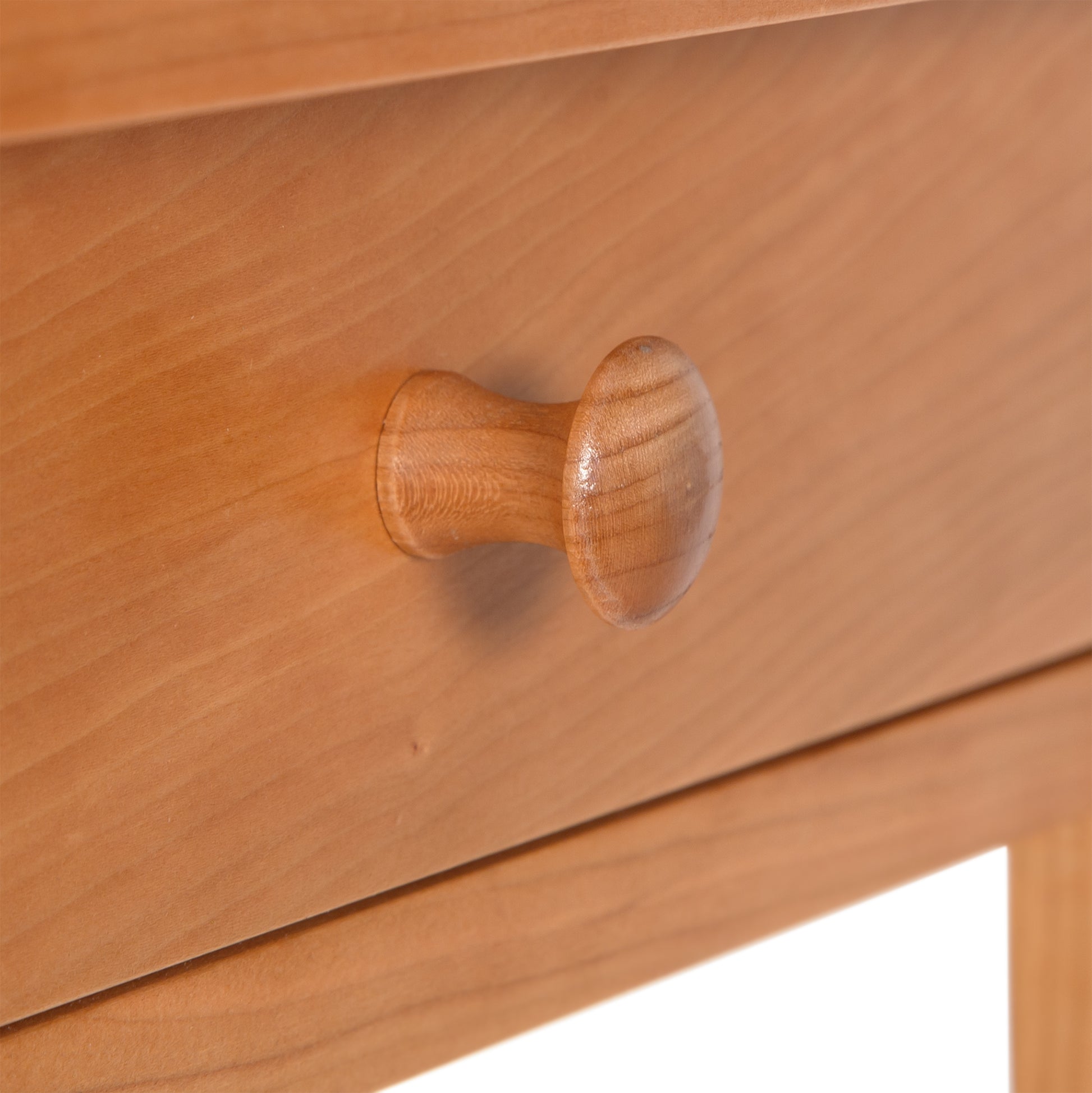 A Lyndon Furniture handmade, eco-friendly Shaker 1-Drawer Nightstand with a wooden drawer and knob.