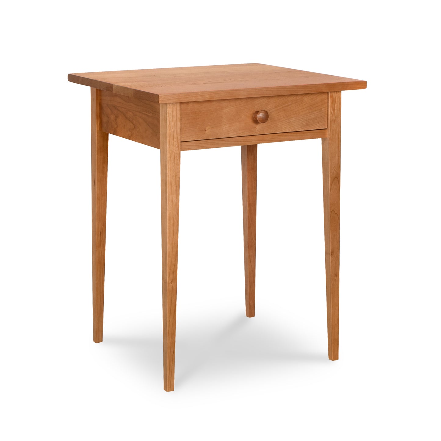 Lyndon Furniture Shaker 1-Drawer Nightstand with tapered legs and classic design, handcrafted from sustainably sourced wood.