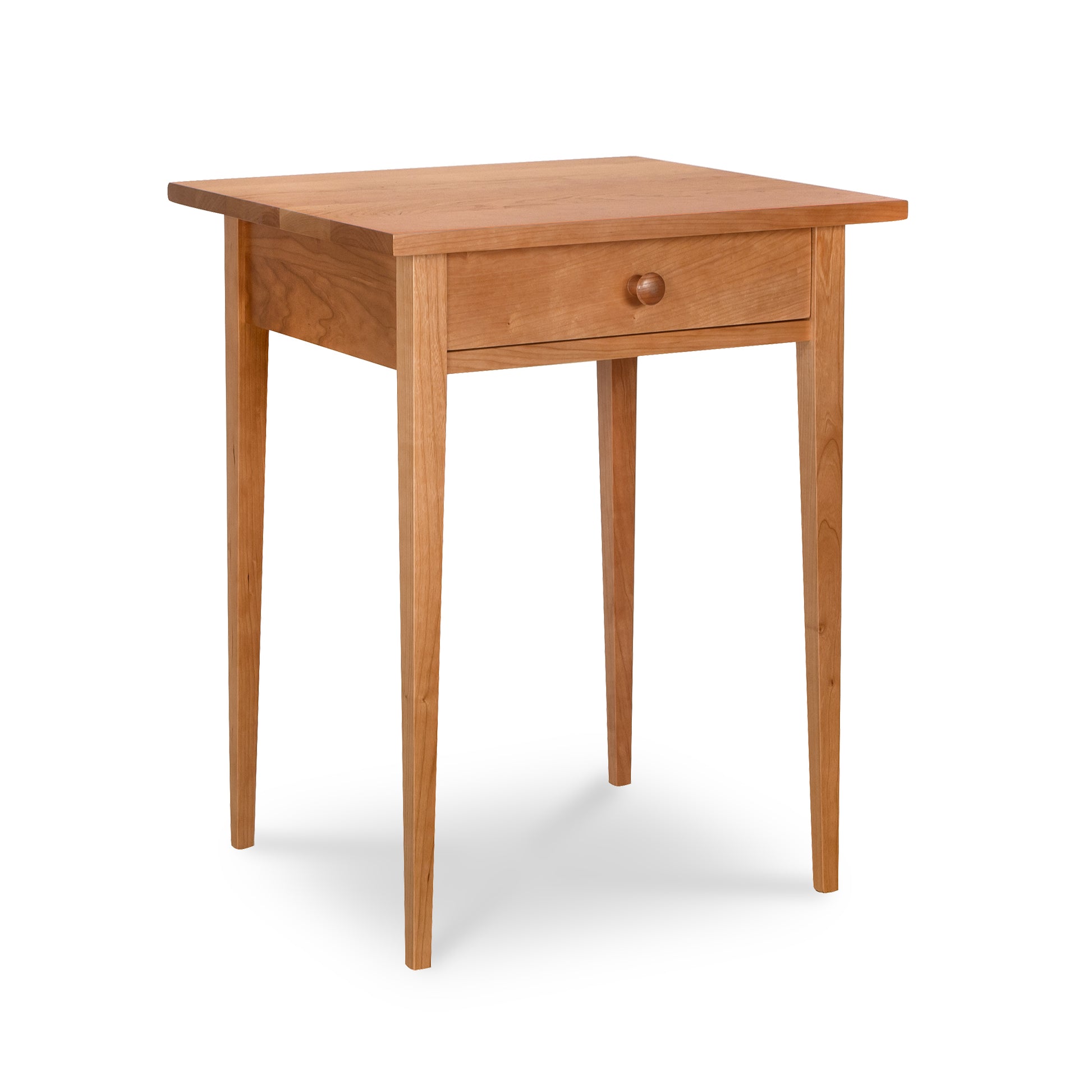 Lyndon Furniture Shaker 1-Drawer Nightstand with tapered legs and classic design, handcrafted from sustainably sourced wood.