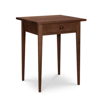 Lyndon Furniture Shaker 1-Drawer Nightstand crafted from solid wood with a single drawer and tapered legs, highlighting its classic Shaker design.