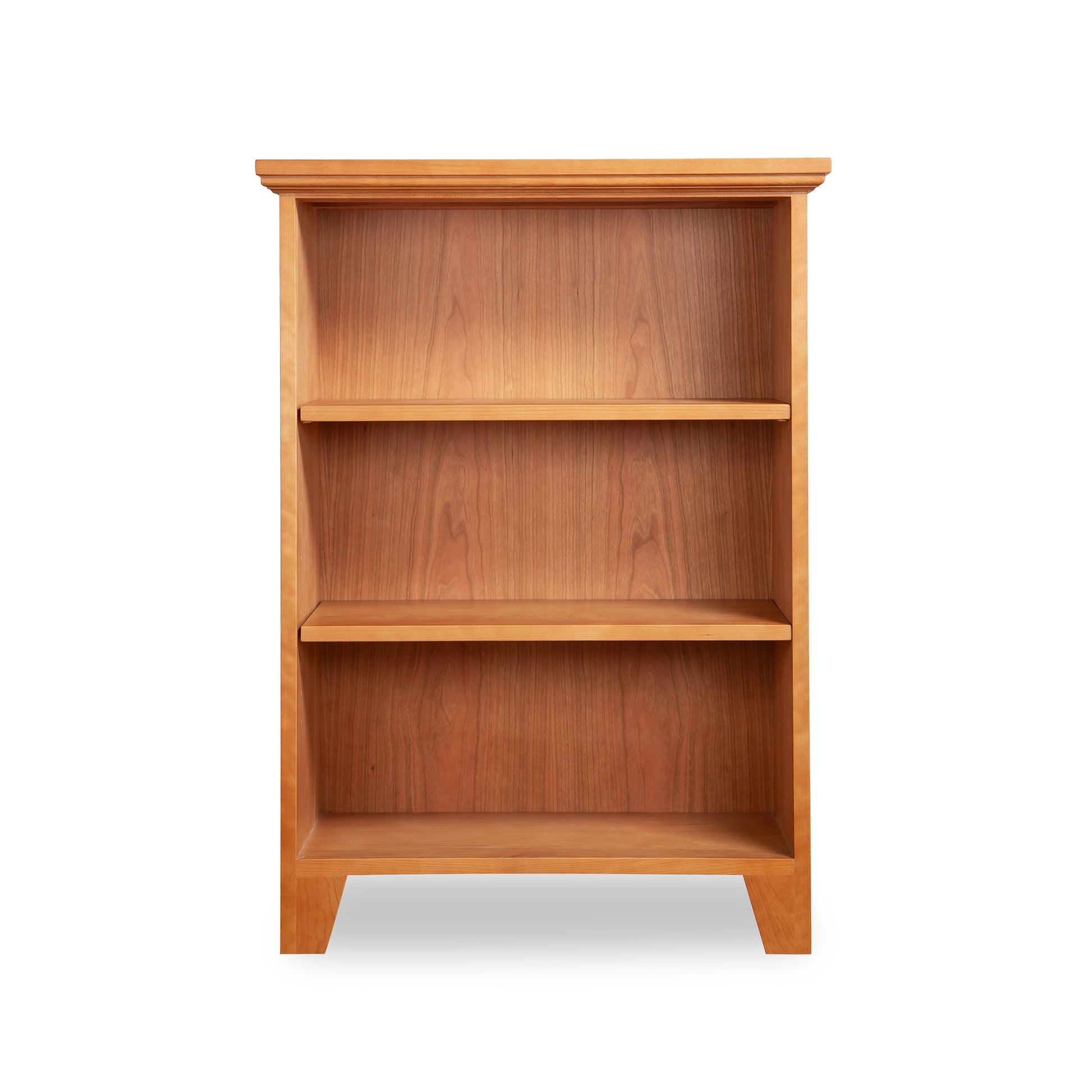 Lyndon Furniture Shaker Bookcase floor model with 3 shelves and natural wood finish, highlighting its craftsmanship and classic design.