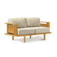 An image of a Sierra Cherry Upholstered Loveseat by Copeland Furniture with a beige cushion in a contemporary design.